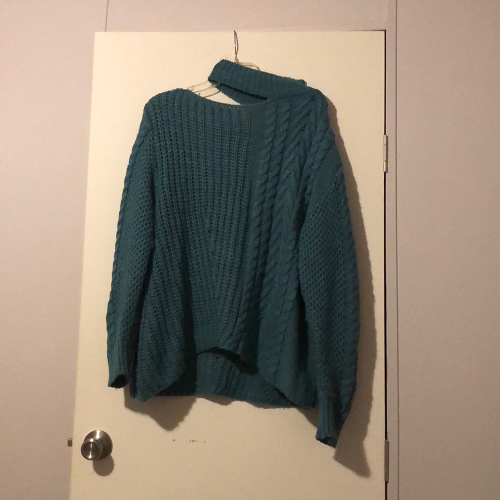 Blue sweater with cutout neck detail